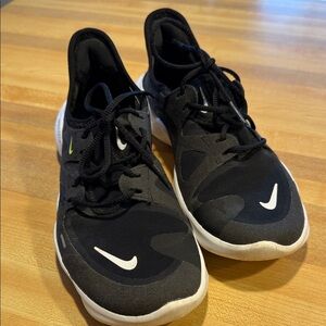 Nike Women’s ' Black and White Active Sneakers